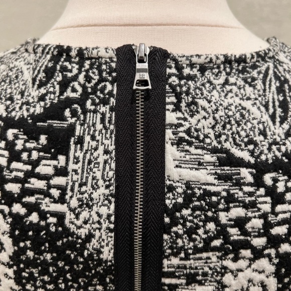 BCBGMAXAZRIA Black and White Peplum Top - Picture 5 of 6